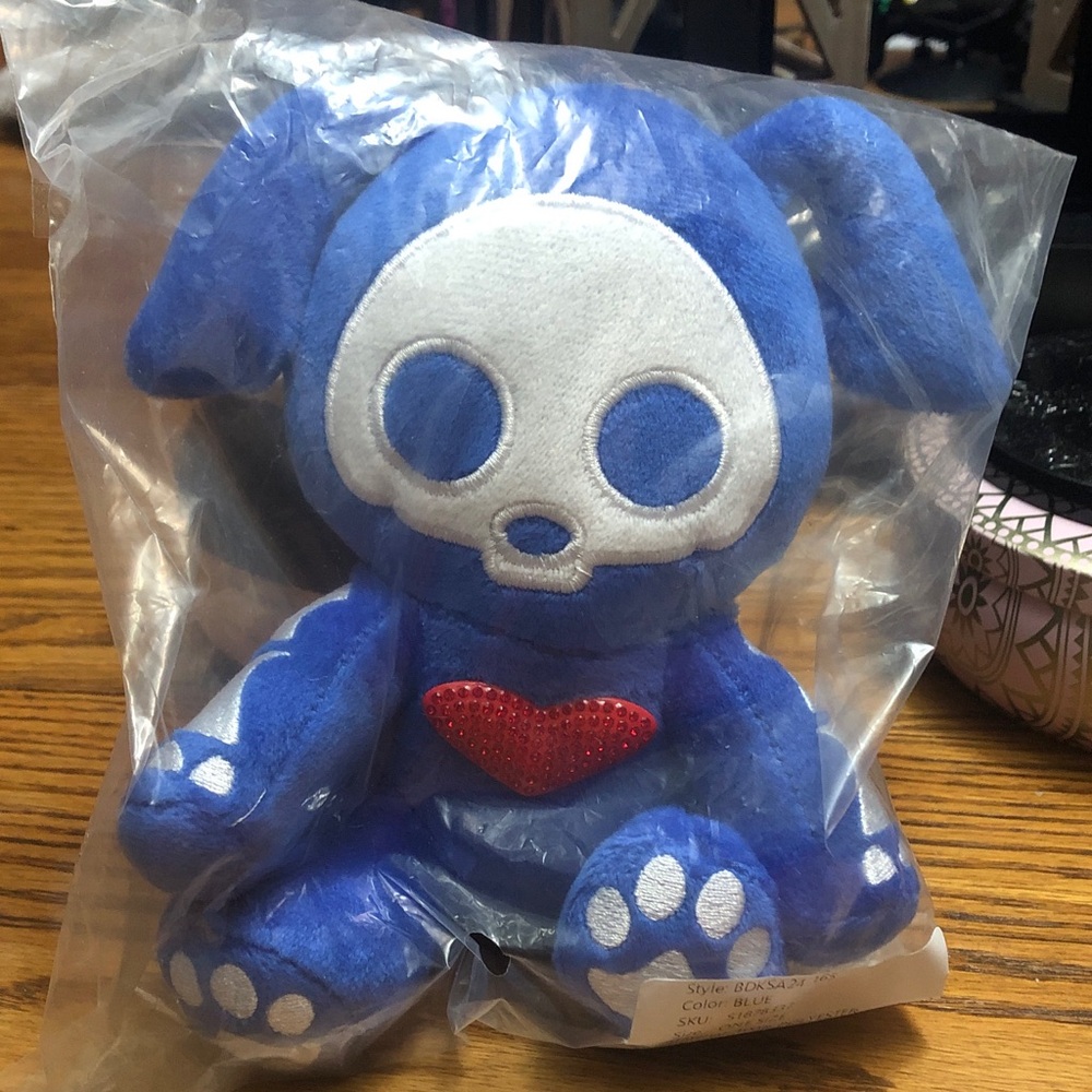 Dolls Kill Blue and White Stuffed Animal
